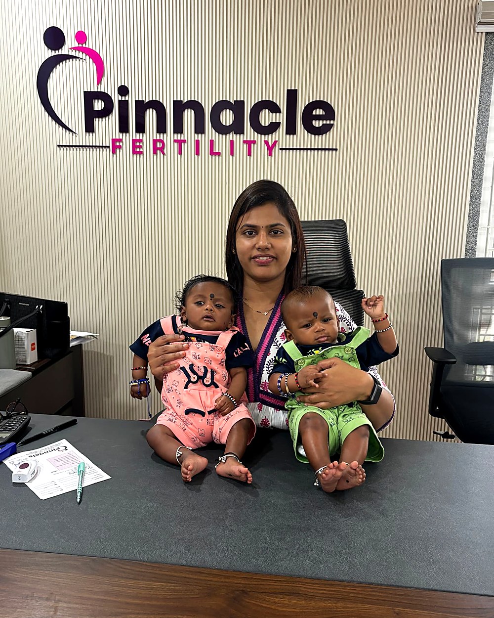 Dr. Archana with IVF twin babies at the Pinnacle Fertility clinic