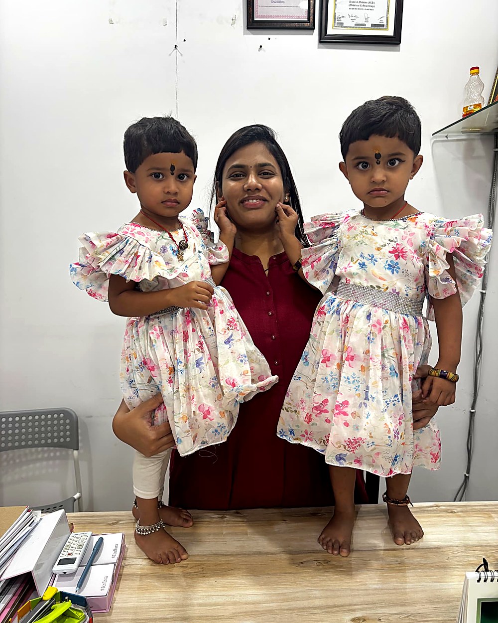 Dr. Archana with twin toddler girls born after fertility treatment