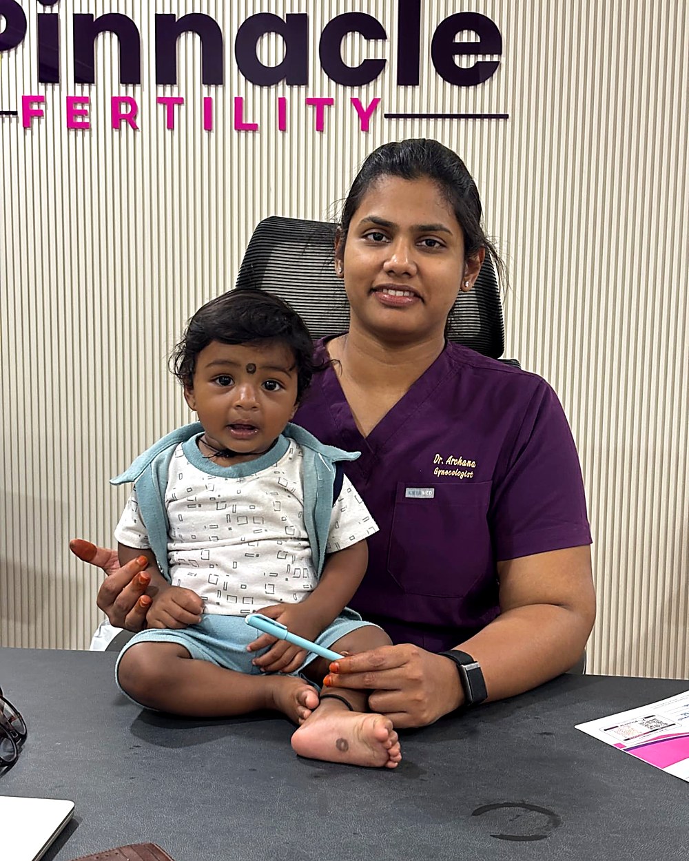 Dr. Archana with a toddler born after IVF at Pinnacle Fertility